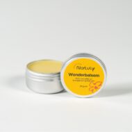 Natuly Kruiden Wonder Balsem in een 50 gram blikje met open balsem